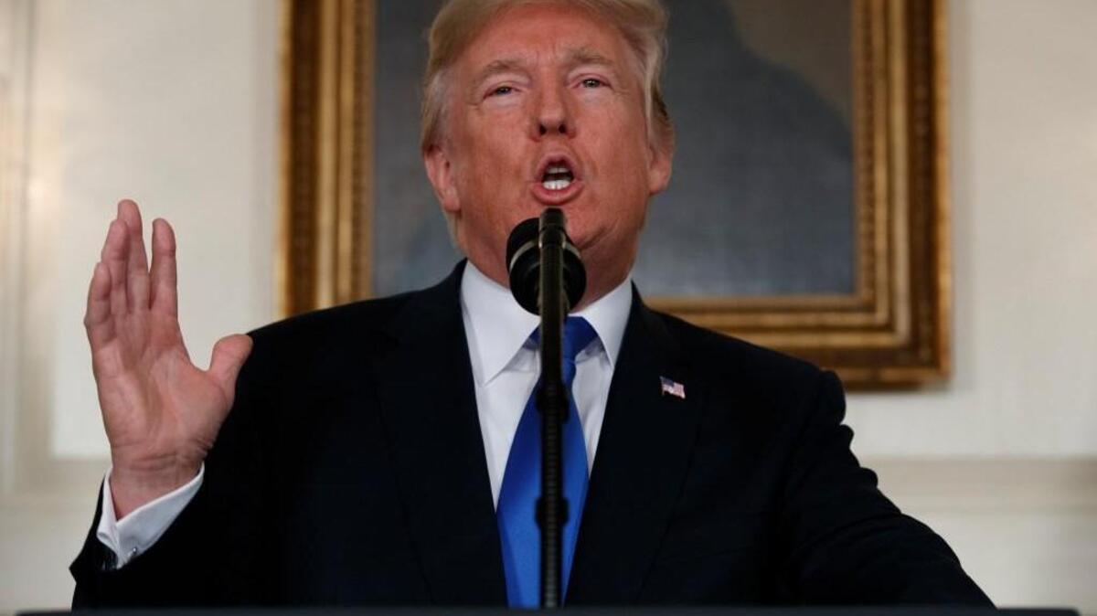 FILE - In this Friday, Oct. 13, 2017 file photo, President Donald Trump makes a statement on Iran policy in the Diplomatic Reception Room of the White House in Washington. While U.S. President Donald Trump angered Iran with his speech on refusing to re-certify the nuclear deal, Tehran won't walk away from it in retaliation.