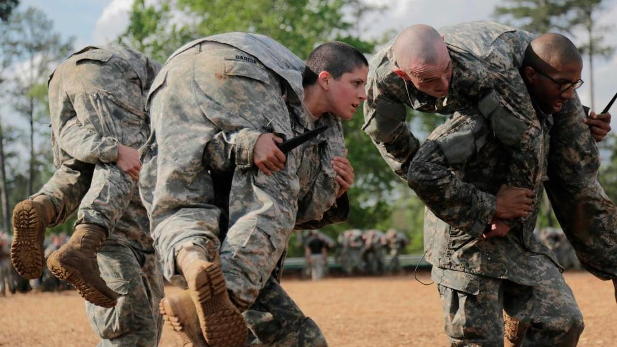 Capt. Kristen Griest, center, participates in combatives training during the Ranger Course at Ft. Benning, Ga., April 20, 2015. Capt. Griest is one of the first two women to graduate from the course. Defense Secretary Ashton Carter on Dec. 3, 2015, announced that the Pentagon will open all combat roles in the military to women. The Pentagon put out a mandate in January 2013 to integrate women into all combat jobs by 2016 or justify exemptions. (Spc. Nikayla Shodeen/U.S. Army via The New York Times) --EDITORIAL USE ONLY