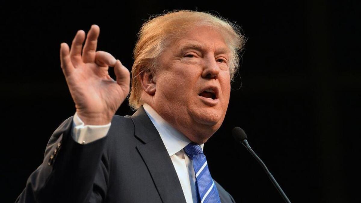 Republican presidential candidate Donald Trump speaks to supporters at Dorton Arena in Raleigh