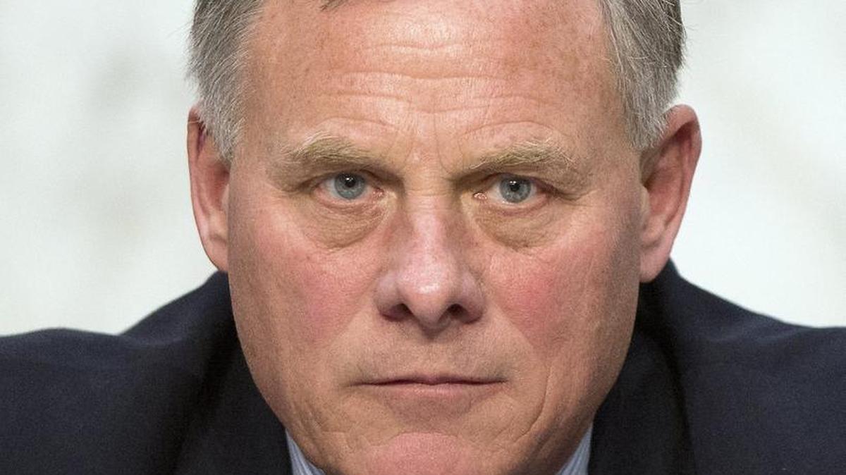 North Carolina Republican U.S. Sen. Richard Burr, chairman of the U.S. Senate Select Committee on Intelligence, has apologized for quipping that he was “a little bit shocked” that there wasn’t a “bullseye” on a rifle magazine’s cover photo of Hillary Clinton.
