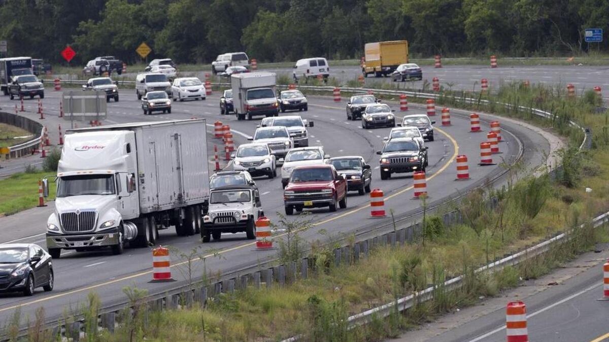 
Traffic on eastbound I-40 approaches the Rock Quarry Road exit on Friday, August 28, 2015 in Raleigh, N.C. In the coming weeks theses lanes will be shifted to a new three-lane pattern between Hammond Road and Rock Quarry Road to match the rest of the Fortify project already under construction.
