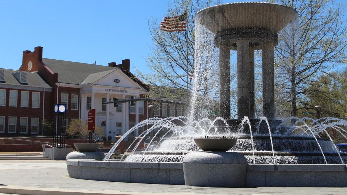 The fountain at Cary’s new downtown park. Home prices in Cary, and all of Wake County, have been declining since June 2022.