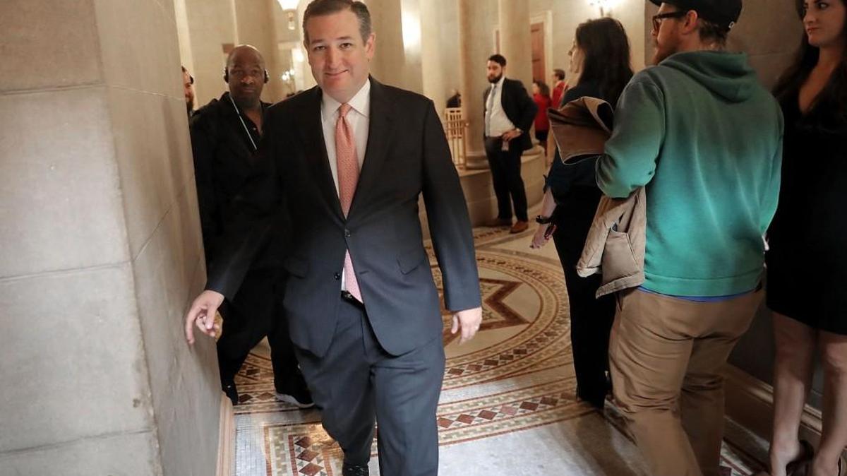 U.S. Sen. Ted Cruz (R-TX) walks through the U.S. Capitol building after a vote, on November 30, 2017. Under an amendment to the GOP tax bill added by Cruz, parents who homeschool their children will be able to deposit money for their K-12 education expenses into tax-favored accounts previously limited to college savings accounts.