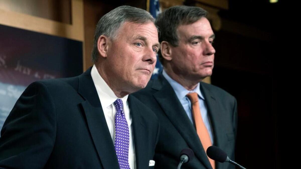 Senate Select Committee on Intelligence Chairman Richard Burr, R-N.C., left, and Vice Chairman Mark Warner, D-Va., update reporters on the status of their inquiry into Russian interference in the 2016 U.S. elections, at the Capitol in Washington.