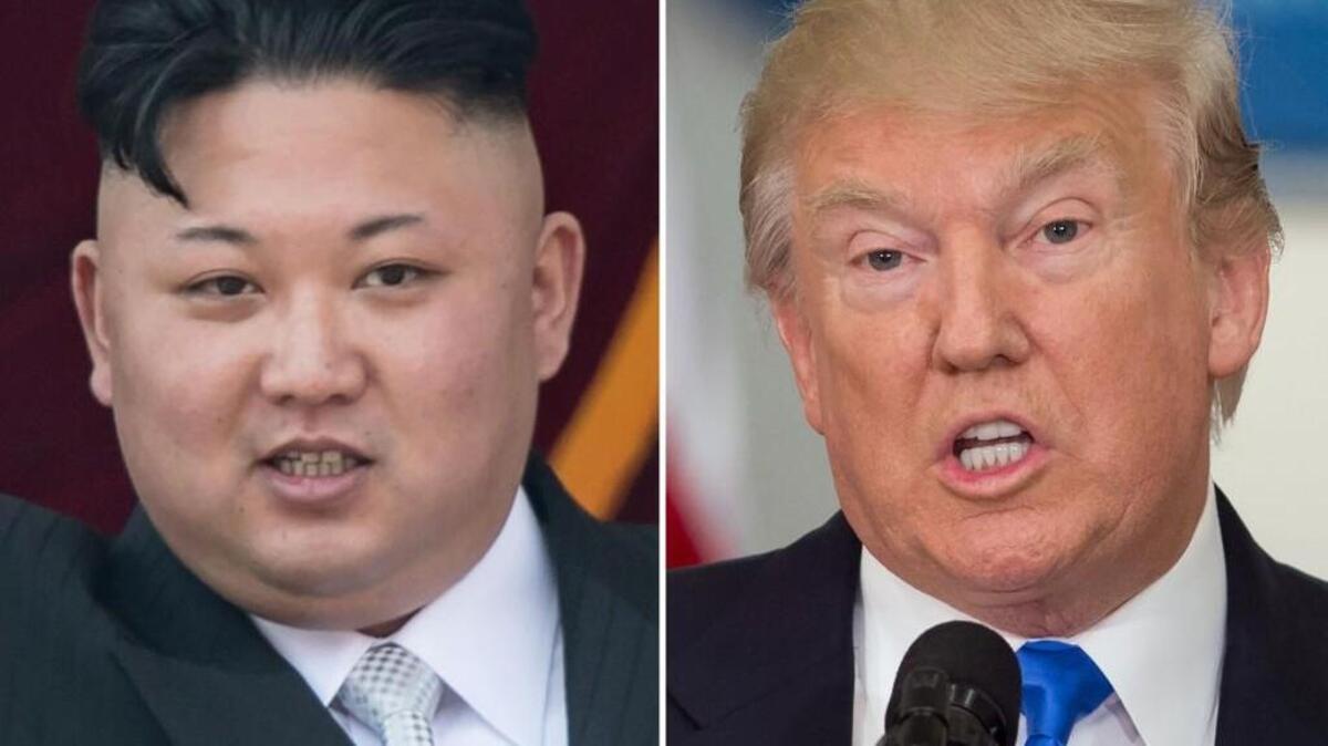 (COMBO) This combo of file photos shows an image (L) taken on April 15, 2017 of North Korean leader Kim Jong-Un on a balcony of the Grand People's Study House following a military parade in Pyongyang; and an image (R) taken on July 19, 2017 of US President Donald Trump speaking during the first meeting of the Presidential Advisory Commission on Election Integrity in Washington, DC. Nuclear-armed North Korea mocked President Donald Trump as "bereft of reason" on August 10, 2017, raising the stakes in their stand-off with an unusually detailed plan to send a salvo of missiles towards the US territory of Guam.
