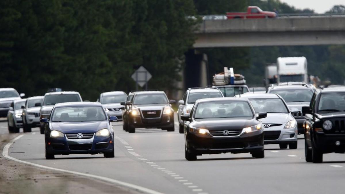 From left, westbound I-540 traffic tries to merge into the already full lanes of traffic at the Six Forks Road westbound onramp during the morning rush hour in north Raleigh, Friday, August 19, 2016.