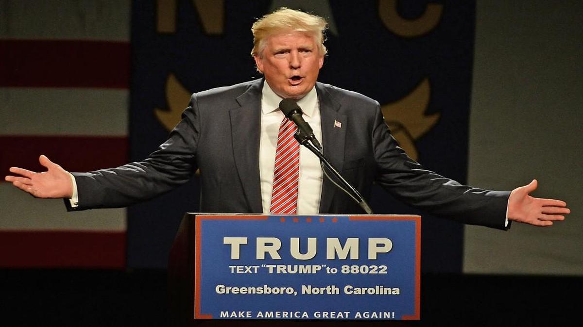 Republican presidential hopeful Donald Trump gestures during his speech at the Greensboro Coliseum on Tuesday.