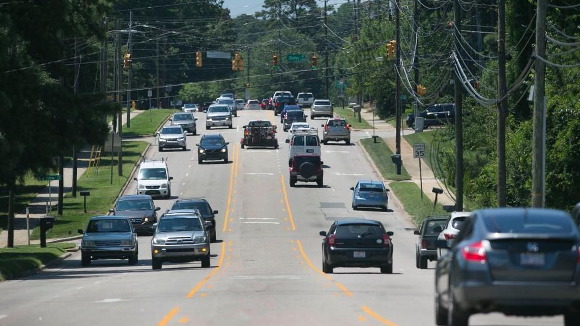 Traffic on Six Forks Road between Millbrook Road and and Shelley Road on Wednesday, July 19, 2017 in Raleigh, N.C. A widening of a section of the road is included in the 2017 transportation bond.