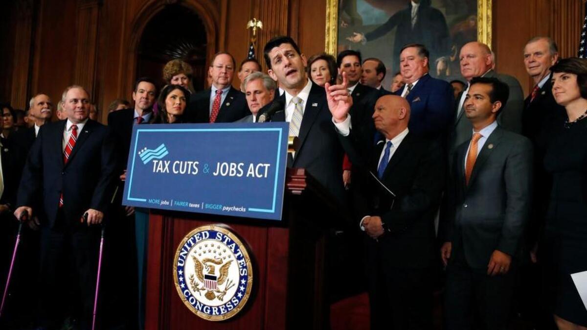 In this Thursday, Nov. 16, 2017 file photo, House Speaker Paul Ryan of Wis., joined by House Republicans, speaks to the media following a vote on tax reform, on Capitol Hill in Washington. A popular deduction targeted in the GOP overhaul of the tax code is used by more than a quarter of all filers in a majority of states, including many led by Republicans where some residents eventually could see their federal tax bills rise.
