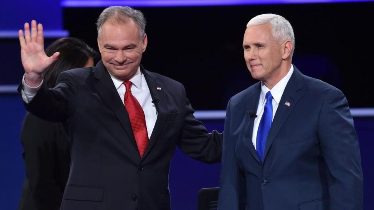 Sen. Tim Kaine, left, and Gov. Mike Pence