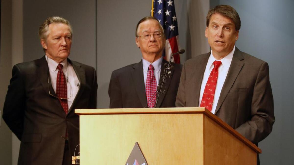 From left, NC Public Safety Secretary Frank Perry, NC Secretary of Transportation Nick Tennyson and Governor Pat McCrory.
