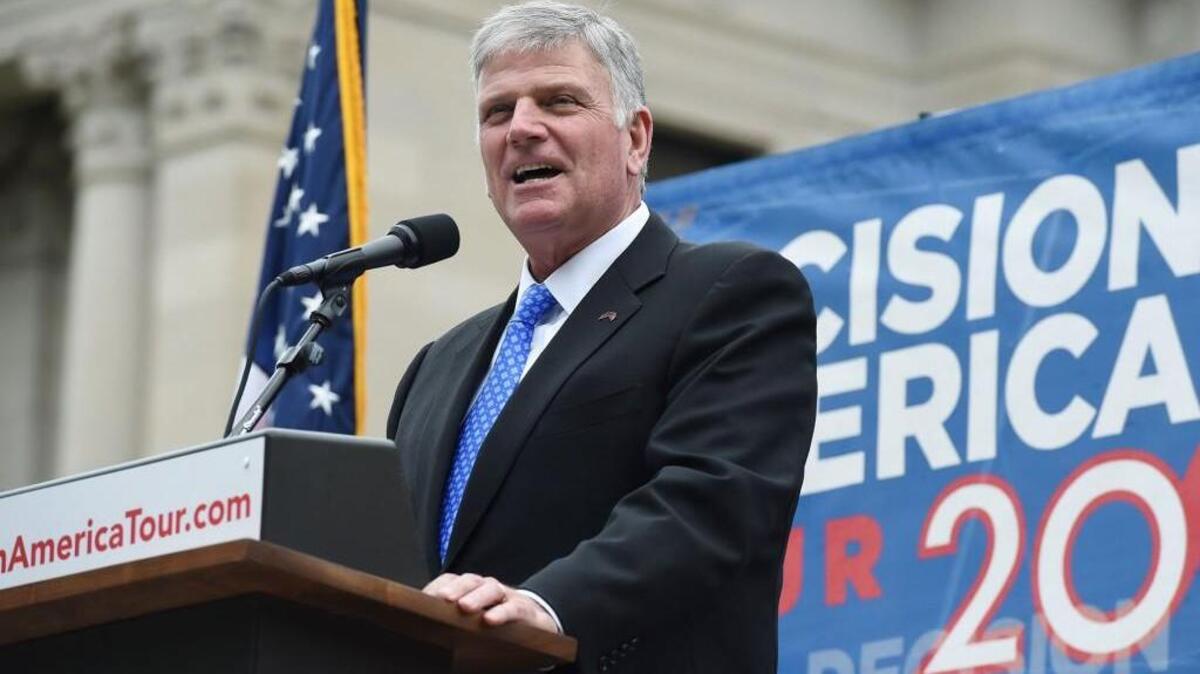 Christian evangelist Franklin Graham, son of Rev. Billy Graham, addresses a large crowd gathered on the south side of the Mississippi Sate Capitol in Jackson, Mississippi, on Wednesday, April 13, 2016, during a stop on his 50-state Decision America Tour. (Joe Ellis/The Clarion-Ledger via AP)