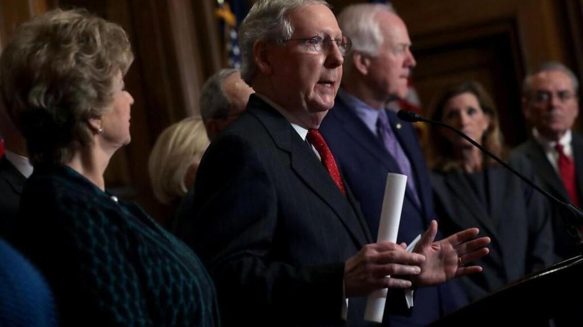 Senate Majority Leader Mitch McConnell (R-KY) (C) and fellow Senate GOP leaders are joined by Small Business Administration Administrator Linda McMahon (L) and representatives from small business interest organizations to rally for their tax reform legislation in the Mansfield Room at the U.S. Capitol November 28, 2017 in Washington, DC. Republicans in the Senate hope to pass their tax cut legislation this week and work with the House of Representatives to get a bill to President Donald Trump before Christmas.