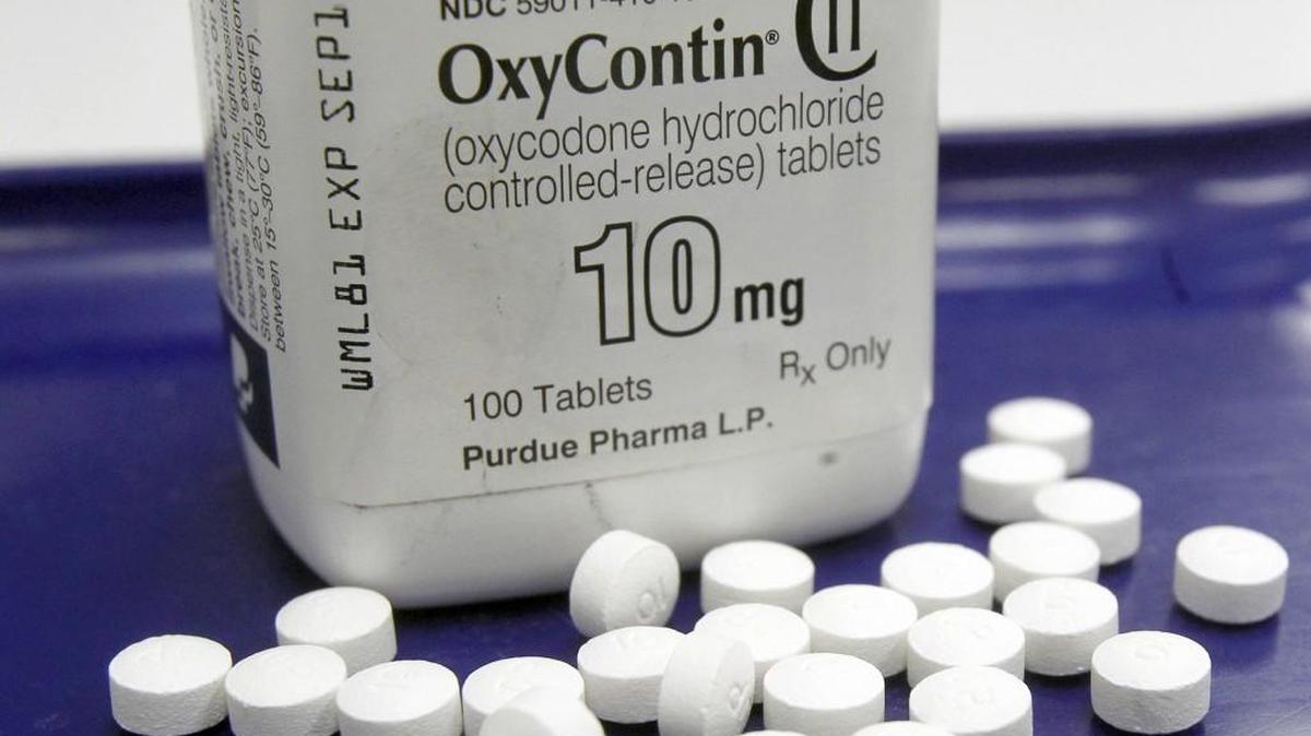 This file photo shows OxyContin pills arranged for a photo at a pharmacy in Montpelier, Vt.