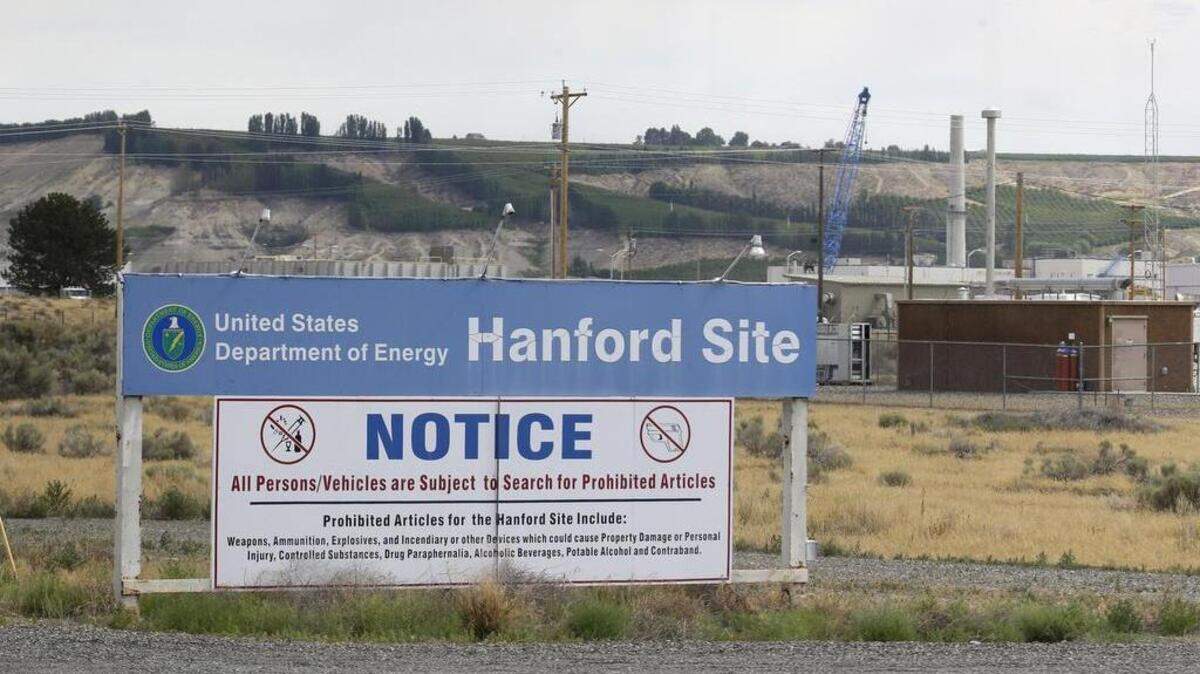 In this July 9, 2014 file photo, a sign informs visitors of prohibited items on the Hanford Nuclear Reservation near Richland, Wash. An emergency has been declared Tuesday, May 9, 2017, at the Hanford Nuclear Reservation after a portion of a tunnel that contained rail cars full of nuclear waste collapsed. Randy Bradbury, a spokesman for the Washington state Department of Ecology, said officials detected no release of radiation and no workers were injured.