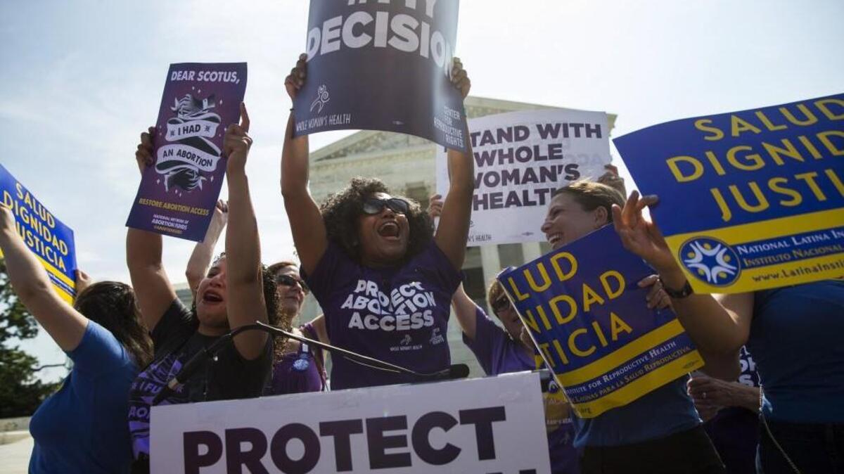 Pro-abortion rights activists rally on June 27, 2016 during at the Supreme Court in Washington.