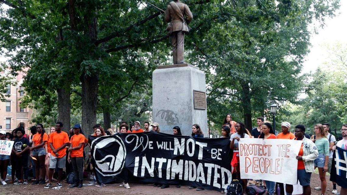 A group of about 100 gathered Aug. 31 at the “Silent Sam” statue on the UNC-Chapel Hill campus to protest, seeking its removal from the school grounds.