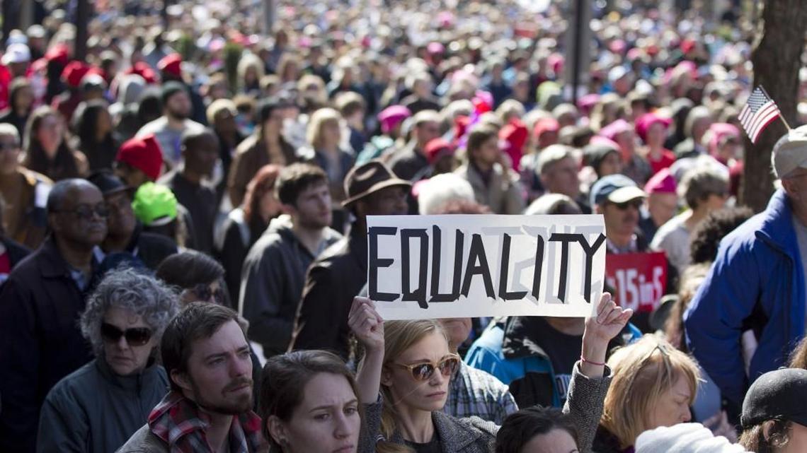 Thousands pack Fayetteville Street to listen as Rev. William Barber addresses the crowd during the annual HKonJ People’s Assembly March on Saturday, Feb. 11, 2017 in Raleigh.