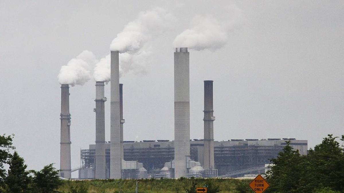 In this Monday, June 2, 2014, file photo, Duke Energy's Gibson Generating Station is seen in Gibson County, Ind. Duke Energy is buying Piedmont Natural Gas for about $4.9 billion in cash, the companies announced, Monday, Oct. 26, 2015. The companies are key partners in the $5 billion Atlantic Coast Pipeline that will be the first major natural gas pipeline to serve eastern North Carolina. (