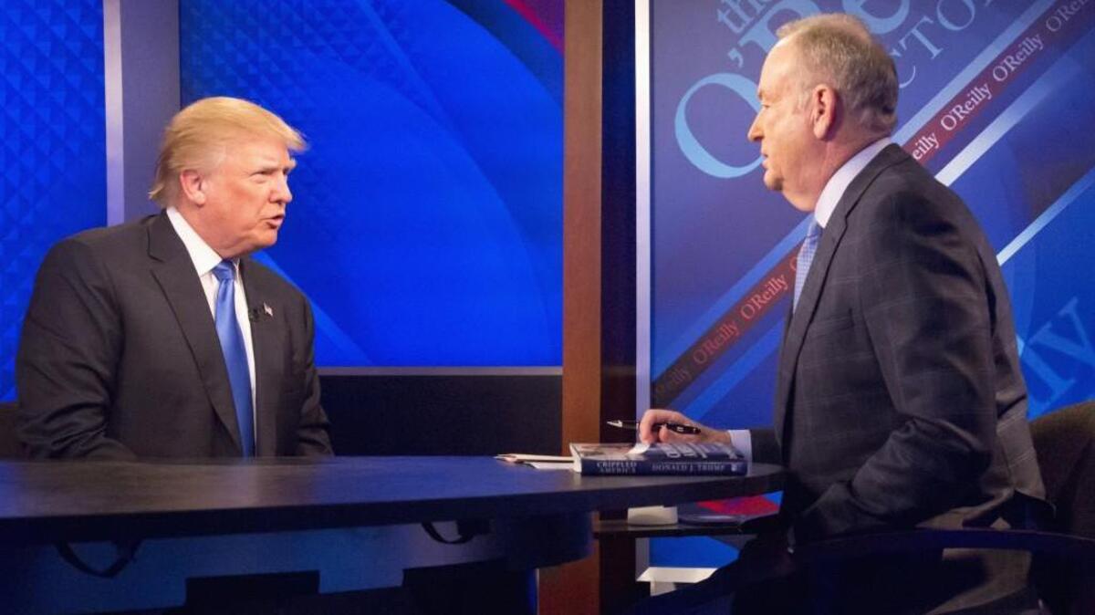 Republican presidential candidate Donald Trump is interviewed by Bill O’Reilly on Fox’s news talk show “The O’Reilly Factor,” on Nov. 6, 2015, in New York. Columnist David Brooks says conservative cable TV and talk radio have diminished conservatism by turning it into “a mass market enterprise.”