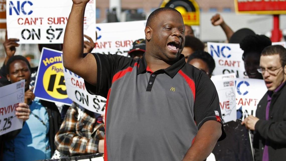 George Hargrove, a McDonald’s worker in Durham, leads a strike chant for the Raise Up protest with other low-wage workers in April.