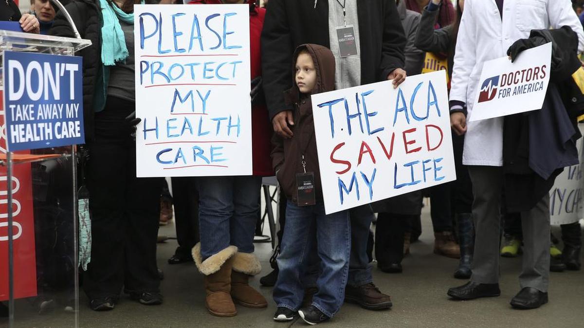 
Americans protested outside the Supreme Court before its ruling upholding Affordable Care Act subsidies.
