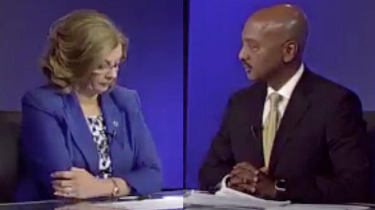 Francis and McFarlane at the debate.