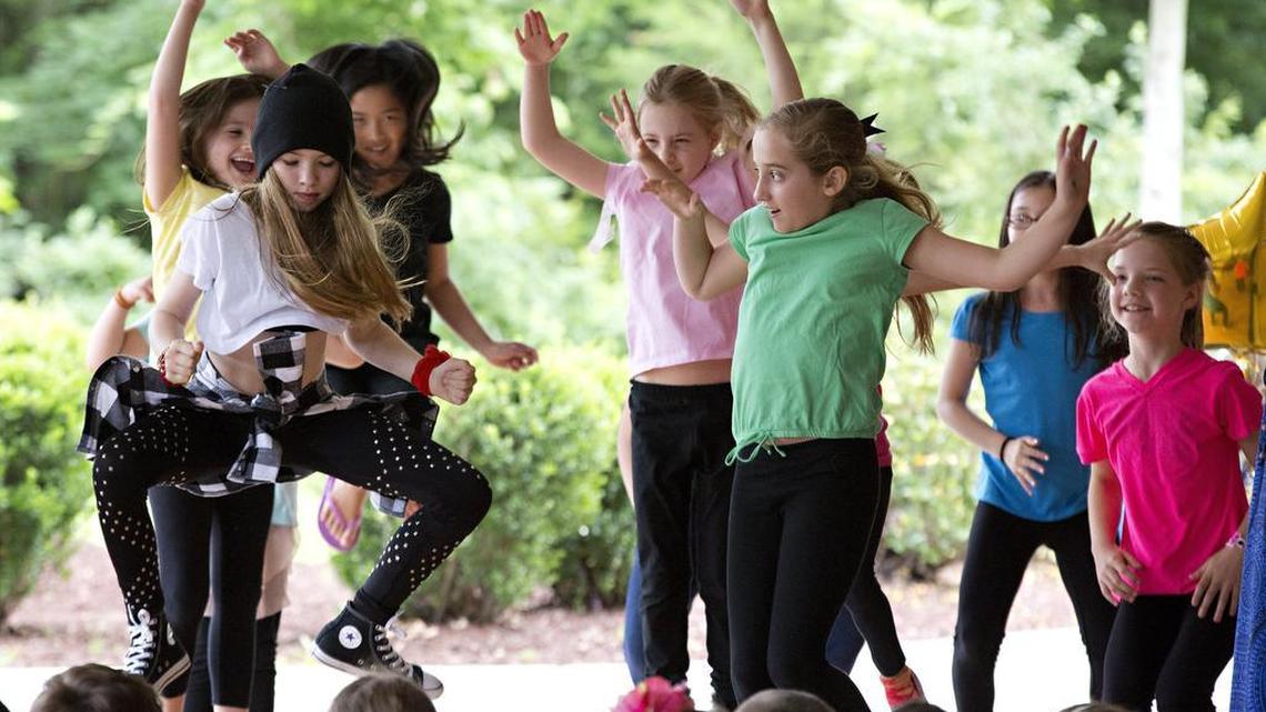 A group of students dance during The Quest Academy charter school’s end-of-year showcase in June 2016 in Raleigh.