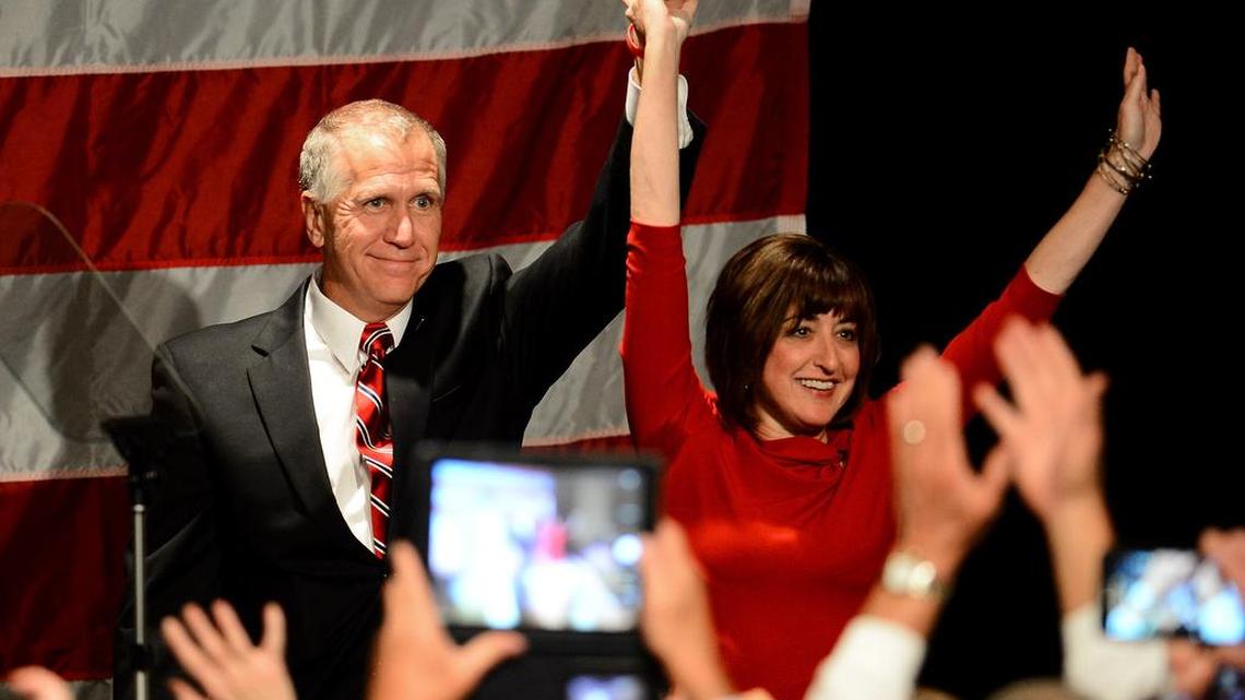 Thom Tillis celebrates with wife Susan after his victory in the U.S. Senate race.