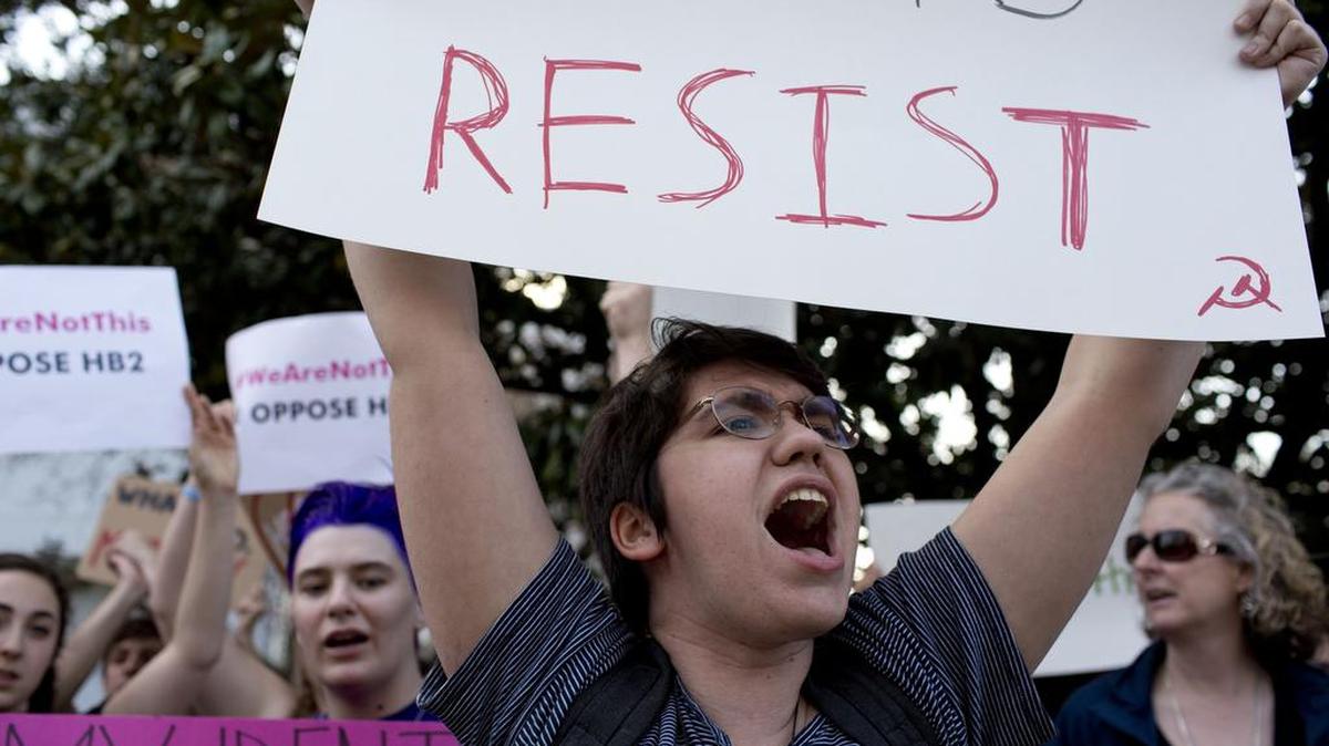 Duke student Sydney Roberts shouts during a protest against House Bill 2 on March 24 outside of the Governor’s Mansion on North Blount Street in downtown Raleigh.