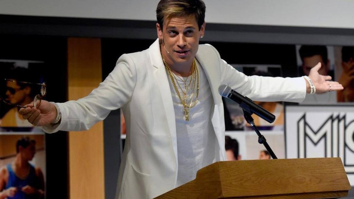 In this Jan. 25, 2017 file photo, Milo Yiannopoulos speaks on campus in the Mathematics building at the University of Colorado in Boulder, Colo. Yiannopoulos, the polarizing Breitbart News editor, has gained notoriety for railing against feminists, Muslims and political correctness. The next stop on his college speaking tour was UC Berkeley, where protests and outrage against the event have stirred a debate about freedom of speech and highlighted the sensitivities on college campuses at the dawn of the Trump presidency.