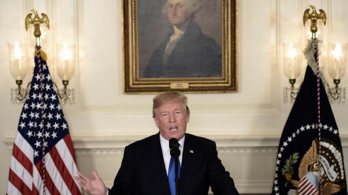 President Donald Trump speaks about the Iran deal from the Diplomatic Reception room of the White House in Washington, DC, on October 13, 2017. Trump announced he will not certify the Iran nuclear deal and warned that the US could leave the Iran deal 'at any time.'