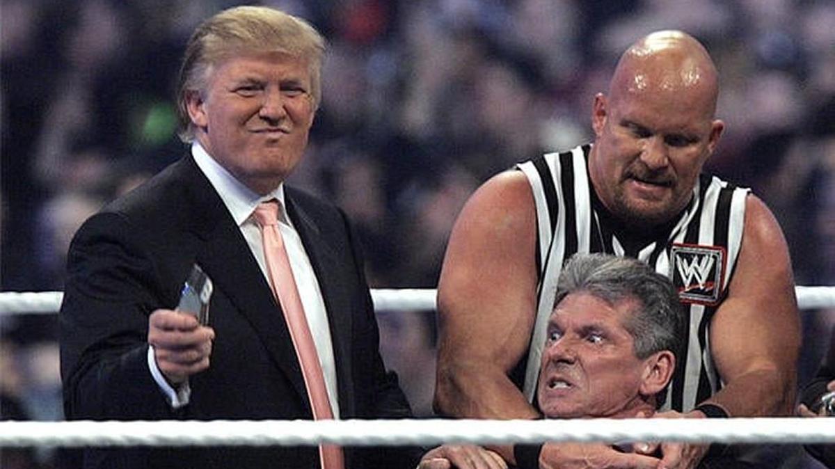 WWE Chairman Vince McMahon, center, held by “Stone Cold” Steve Austin, prepares to have his hair cut off by Donald Trump at Wrestlemania 23 on April 1, 2007.