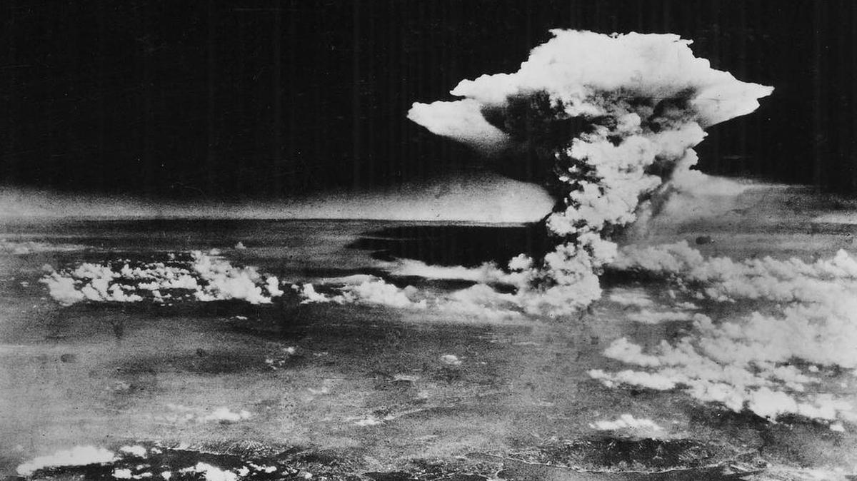 
The plume of smoke from a mushroom cloud billows about one hour after the nuclear bomb was detonated above Hiroshima, Japan on Aug. 6, 1945. 
