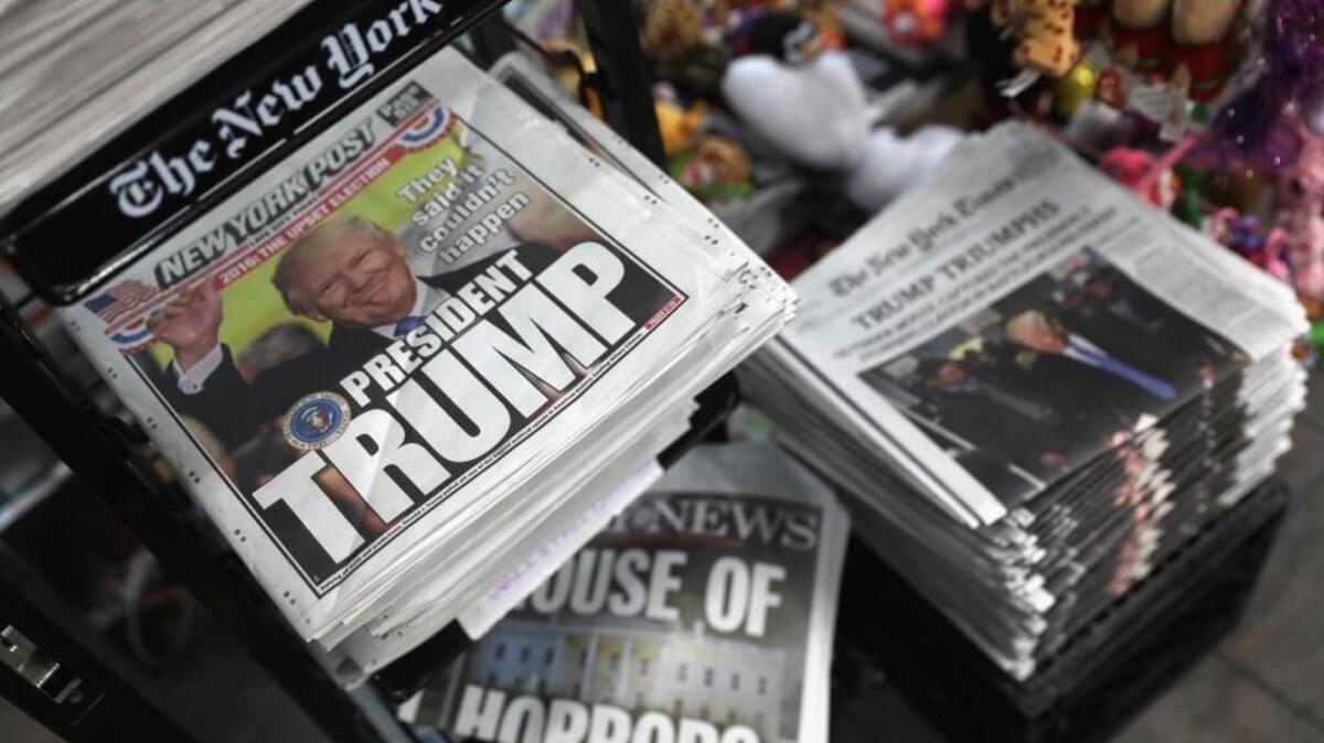 Front pages from New York City newspapers feature President-elect Donald Trump on November 9, 2016 in New York City.