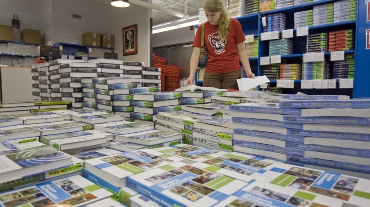 
N.C. State student Miranda Beshears, a freshman from Boone, shops for textbooks at the N.C. State University Student bookstore on the school’s campus. 
