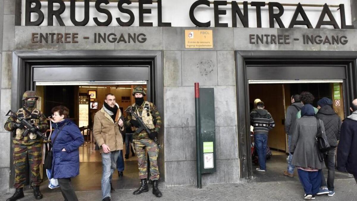 Police secure the central station in Brussels on Wednesday, a day Bombs exploded, killing and wounding many.