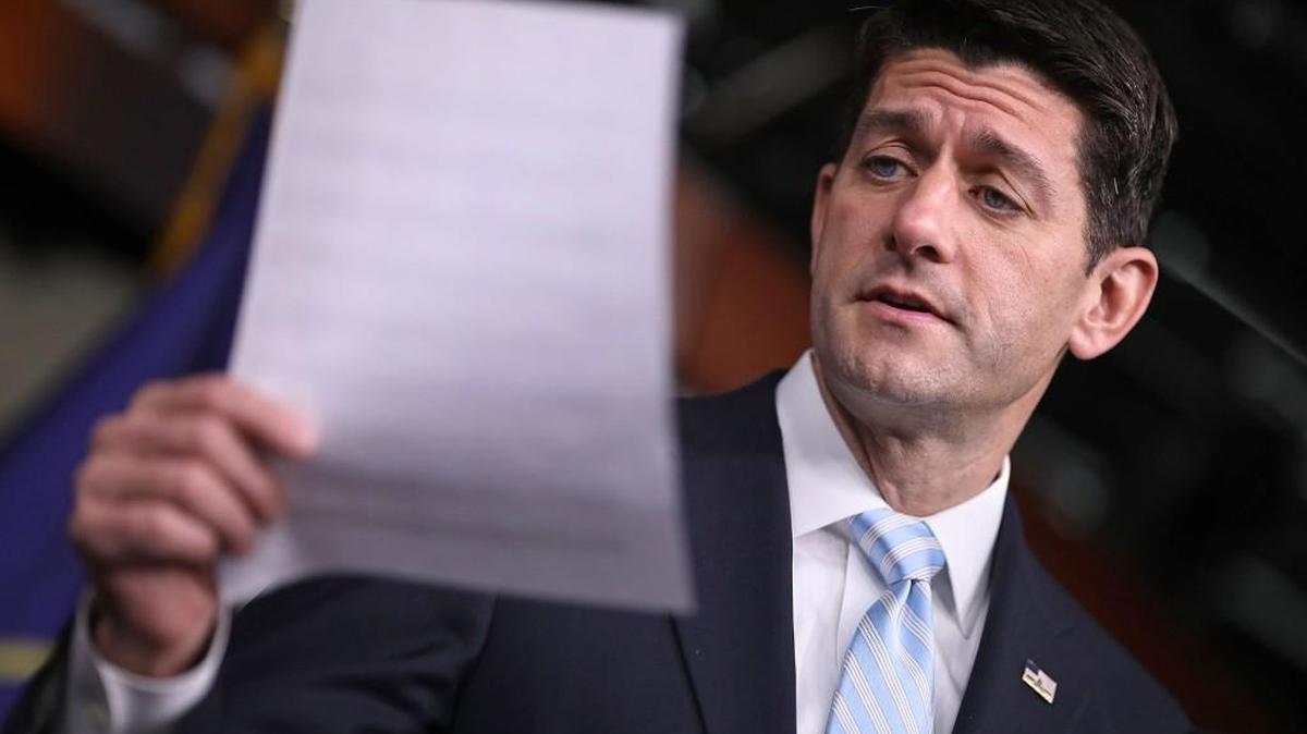 Speaker of the House Paul Ryan (R-WI) reads from a list of states with increasing health insurance premiums during his weekly news conference in the Capitol Visitors Center at the U.S. Capitol Jan. 12, in Washington, DC. Ryan said that Congressional Republicans are on a “rescue” mission to repeal and replace the Affordable Care Act and that he and President-elect Donald Trump are in perfect sync with the process or replacing Obamacare, but Trump’s recent comments indicate they are on different pages.