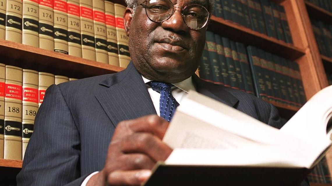 Julius Chambers in his law office in 2002.