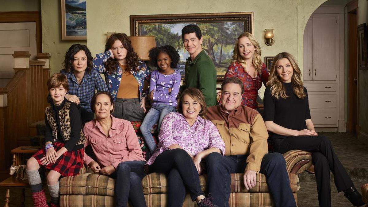 The “Roseanne” reboot doesn’t have a clear message to send to Trump supporters or the working class. GOODMAN, LECY GORANSON and SARAH CHALKE in ABC’s “Roseanne.”