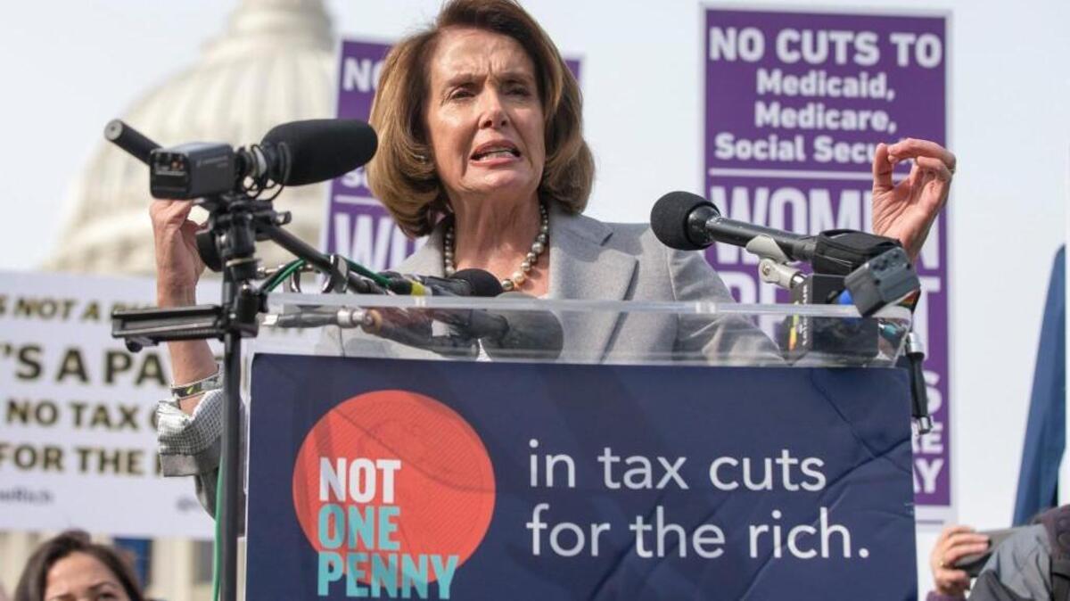 House Minority Leader Nancy Pelosi (D-Calif.) speaks during a rally led by Congressional Democrats against President Donald Trump's proposed tax plan, outside the United States Capitol in Washington, D.C., on November 1, 2017.