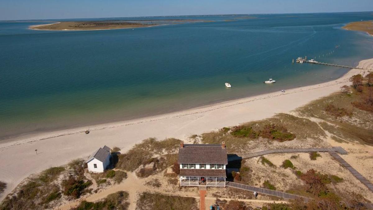 In an undated photo provided by VisitNC.com., a view from the top of the Cape Lookout Lighthouse shows the eastern end of Shackleford Banks, part of the Cape Lookout National Seashore.