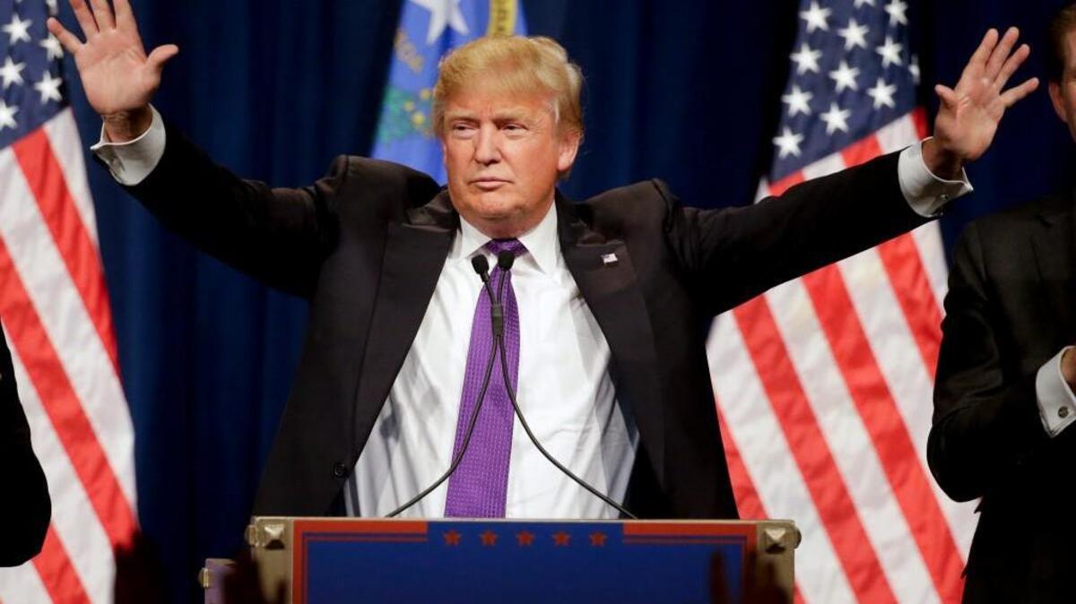 Donald Trump speaks during a caucus night rally Tuesday in Las Vegas.
