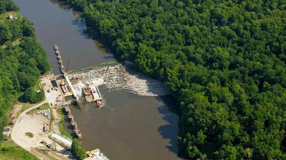 A June 2012 photo of Cape Fear Lock and Dam No. 1: Next spring, the locks won't need to be opened to allow shad to swim upriver. A 200-foot slope of rocks, piled on the downstream side, will allow the fish to swim over the dam on their own.