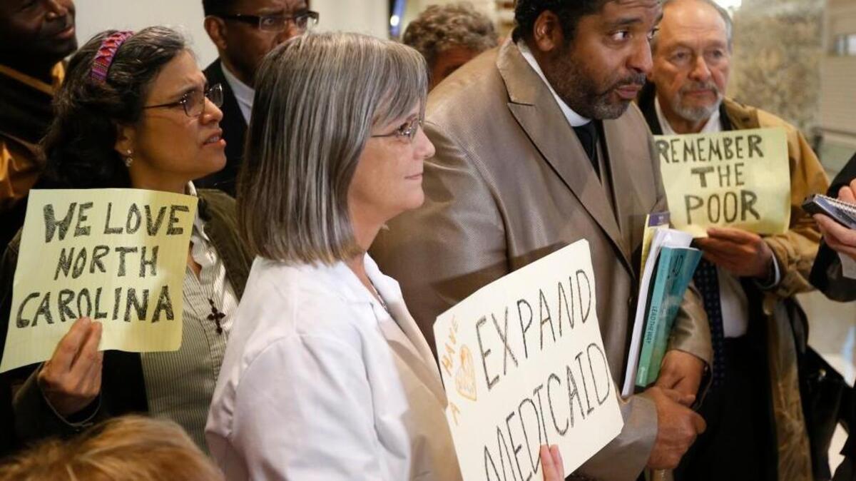 The Rev. William Barber holds a press conference after Barber and 11 other demonstrators were found guilty in Wake County district court on Wednesday, December 4, 2013, of second-degree trespass and violating one of the N.C. Legislative Building rules in a trial related to "Moral Monday" protests.