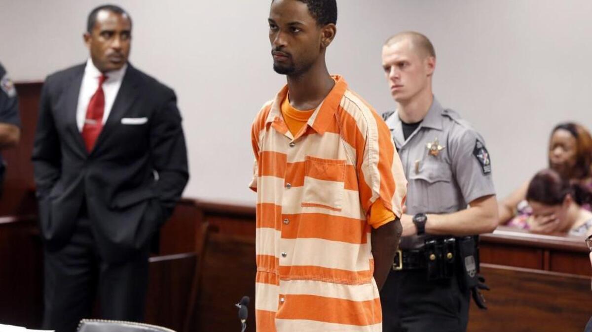 Travion Devonte Smith makes his first appearance at the Wake County Courthouse in 2013, after being charged with the murder of Melissa Dawn Huggins-Jones.