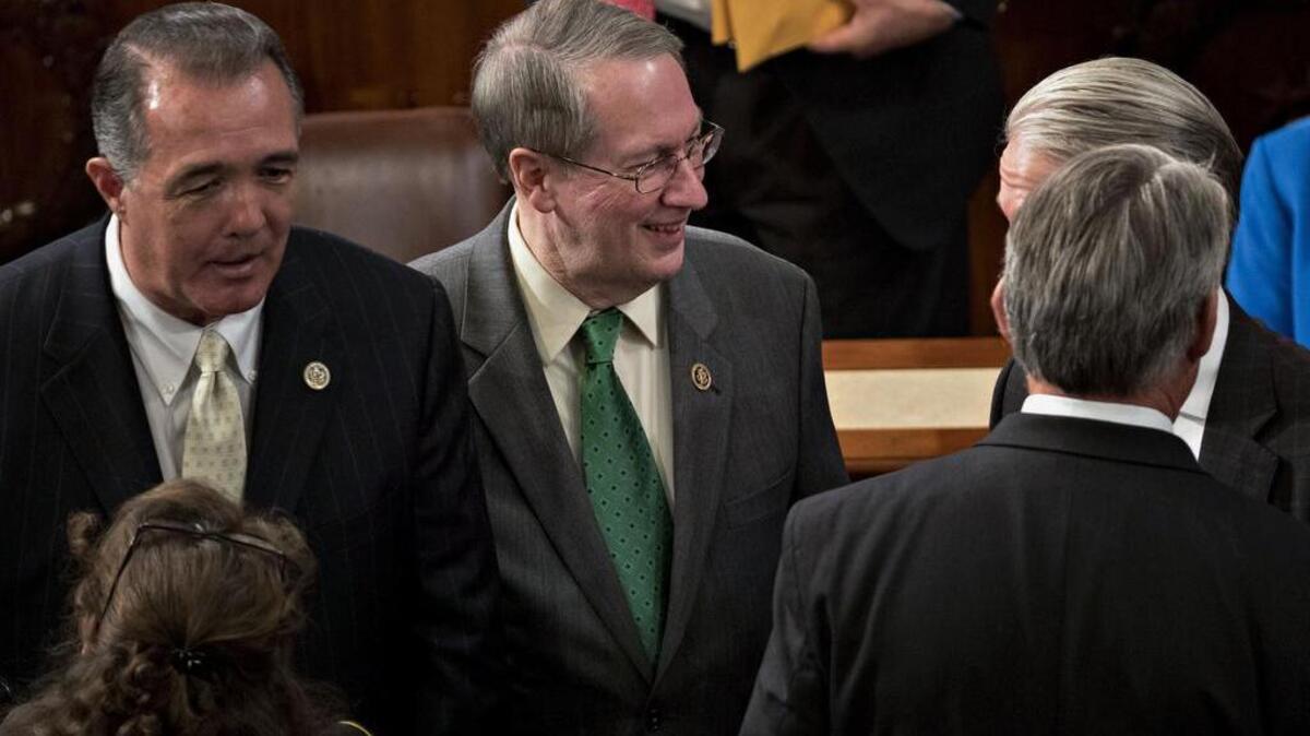 Representative Bob Goodlatte (center), a Republican from Virginia and chairman of the House Judiciary Committee, in the House Chamber on Tuesday. House Republicans dropped their bid to weaken the independent Office of Congressional Ethics after President-elect Donald Trump blasted the move as counter to his call to "drain the swamp" of corruption in Washington.