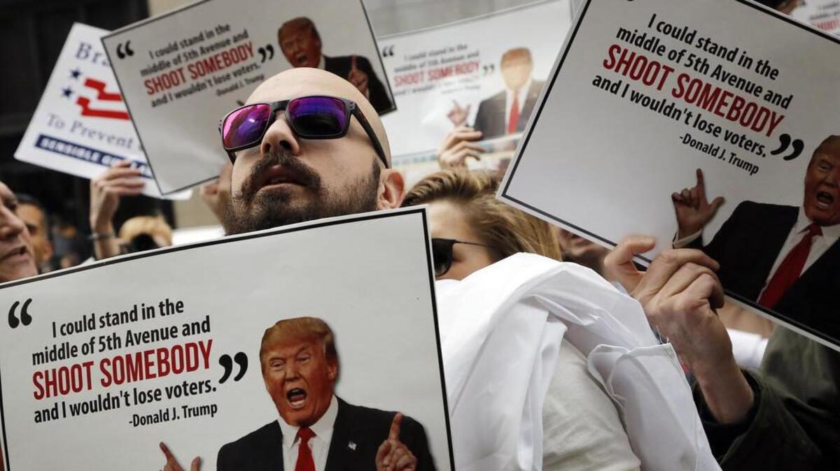 Protesters, organized by The Brady Campaign to Prevent Gun Violence, stage a die-in in front of Trump Tower.