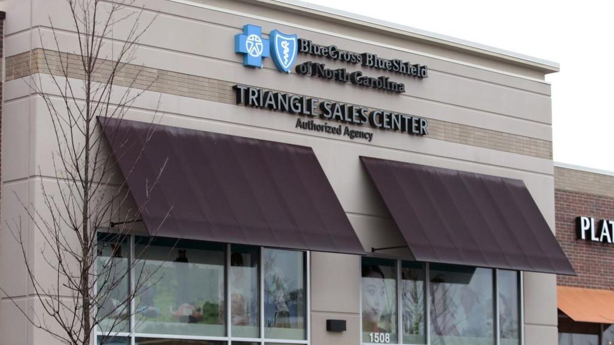 A client enters the Blue Cross Blue Shield of North Carolina Triangle Sales Center in the Village Market Place shopping center in Morrisville, NC Saturday, January 9, 2016.