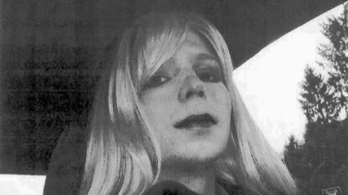 In this undated file photo provided by the U.S. Army, Pfc. Chelsea Manning poses for a photo wearing a wig and lipstick. On Tuesday, Jan. 17, 2017, President Barack Obama commuted the sentence of Chelsea Manning, who leaked Army documents and is serving 35 years. (U.S. Army via AP)